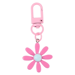 Pink daisy flower keychain with blue center and D-clasp for Airpods accessory