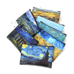 Detail of artistic coin purses featuring Van Gogh oil painting prints and metal zipper rings