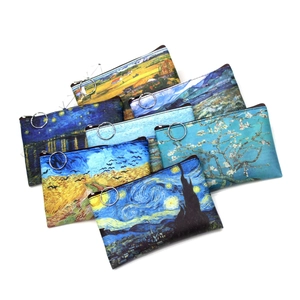 Detail showing printed canvas coin purses featuring Van Gogh oil painting art designs