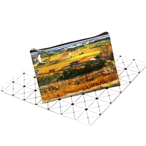 Detailed close-up of a vintage oil painting coin purse with a silver circular zipper puller