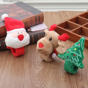 Detailed view of plush Christmas snap bracelets featuring Santa Claus and Reindeer designs