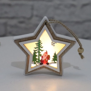 Close-up of star-shaped wooden Christmas ornament with LED warm lighting and Santa design
