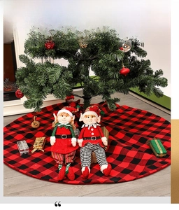 Detail of red and black buffalo plaid Christmas tree skirt with festive elf doll ornaments