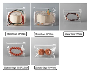 Transparent PVC storage bags in five sizes showing jewelry and beads inside