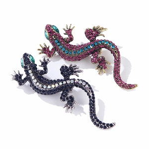 Vintage lizard brooches with colorful rhinestones in gold and silver metal finishes