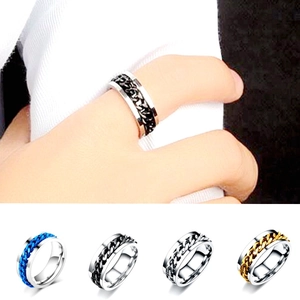 Detail view of rotatable titanium steel chain rings in silver, blue, black, and gold colors