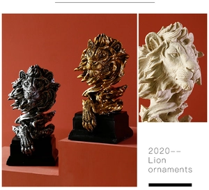 Macro detail showing lion head ornaments with intricate mane texture and solid base
