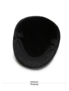 Detailed interior view of a men's winter hat featuring soft black fleece lining for warmth