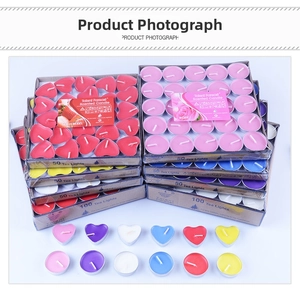 Close-up of heart and round smokeless tea light candles in various colors for proposals