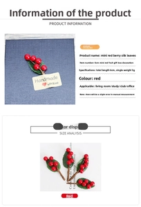 Dettaglio di mini bacche rosse con foglie di seta ed etichetta regalo Handmade with love