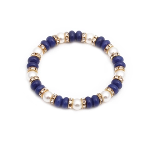 8mm pearl and blue lapis bead bracelet with sparkling gold crystal spacers on white background