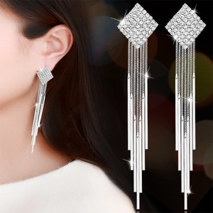 S925 silver long tassel earrings with sparkling diamond rhombus studs shown on model