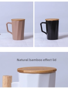 Detail of modern matte ceramic mug featuring a faceted geometric body and natural bamboo lid