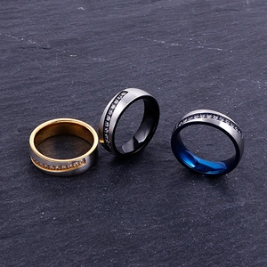Three-piece stainless steel ring set with crystals in black gold and blue finishes