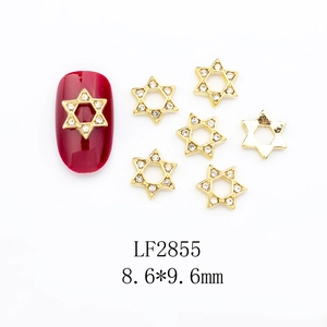 Golden hexagram nail charms with shiny rhinestones, dimensions 8.6mm by 9.6mm