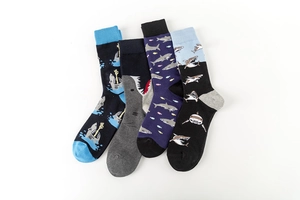 Detail view of assorted shark pattern cotton crew socks in navy, grey, purple and black