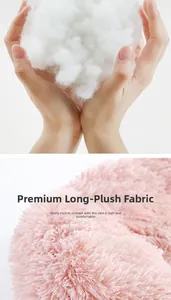 Detail of pink long plush fabric and high-elastic white PP cotton filling