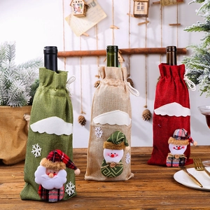Set of 3 linen Christmas wine bottle covers with Santa and Snowman holiday figures