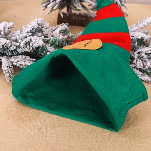 Christmas elf hat with red and green stripes and ears for festive party decorations