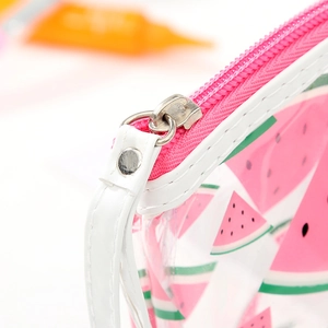 Close-up of the metal zipper and stitching on the transparent watermelon PVC makeup bag