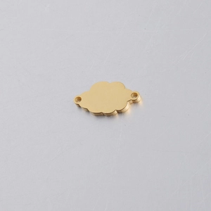 Macro view of gold stainless steel cloud charm connector with polished mirror finish