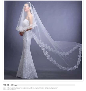 Elegant 3-meter single layer white wedding veil with intricate lace edge on a model