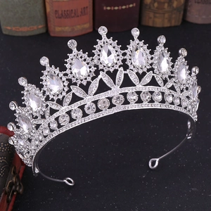 Macro detail of Baroque silver bridal crown with crystal rhinestones and pear-shaped gems