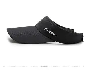 Close-up of black mesh visor featuring white SPORT embroidery and breathable texture