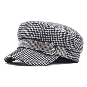 Chic houndstooth baker boy hat with sparkling rhinestone band and silver metallic buckle