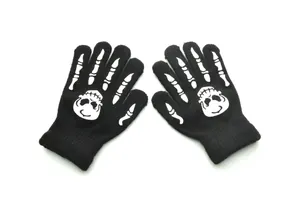Detail view of the ribbed cuff on black winter knit gloves with luminous skeleton print