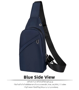 Detail view of navy blue chest bag with durable fabric and integrated headphone port