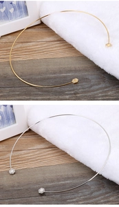 Detail of hexagon diamond-studded open chokers in gold and silver stainless steel
