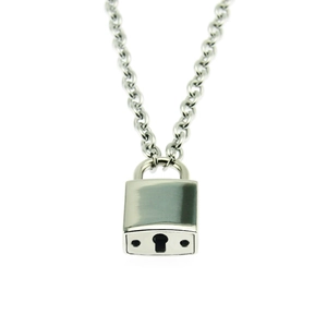 Macro view of silver padlock pendant with keyhole on a classic link chain necklace