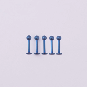 Set of five blue 316L stainless steel lip rings with flat back on white background