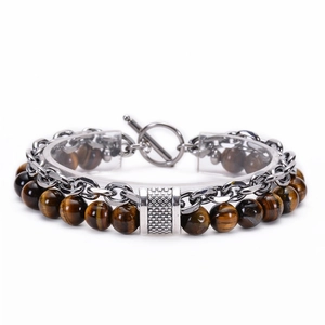 Detail of tiger eye stone beads with silver chain and toggle clasp on men's bracelet