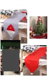 Detailed view of red and grey felt Christmas table runners with gnome and pompom accents