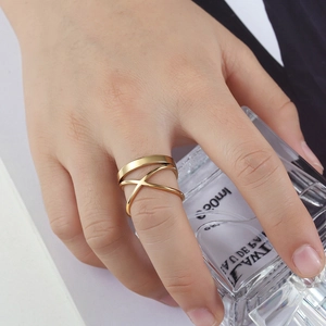 Minimalist double-layered gold stainless steel X-shaped ring with a polished finish