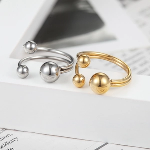 Minimalist double-line stainless steel ring with polished round beads in gold and silver