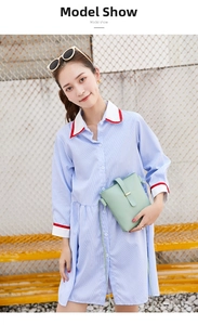 Mint green mini bucket bag for women with leather strap and metal buckle in use
