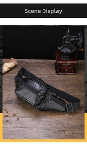 Detail view of a black multi-pocket PU leather waist bag on a vintage wooden table