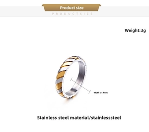 Detail of 4mm stainless steel ring with gold and silver diagonal gear pattern texture