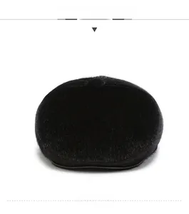 Detail view of winter black flat cap showing soft faux fur texture and warm plush lining