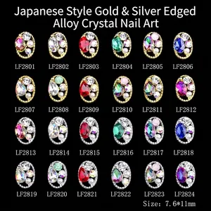 Mixed set of 24 K9 alloy nail art gems with oval water drop rhinestones in gold and silver