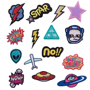 Detailed view of 14-piece universe space theme embroidered patches with space motifs