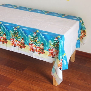 Détails de nappe de Noël en plastique avec motifs bleus de Père Noël et bonshommes de neige