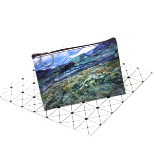 Detail of oil painting style coin purse showing Van Gogh green field print and metal zipper