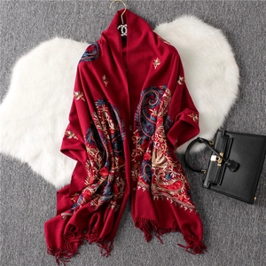 Ethnic embroidered paisley shawl with crimson cashmere blend and elegant tassel fringe