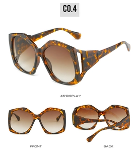 Detailed views of tortoiseshell sunglasses featuring wide hollow temples and brown gradient lenses