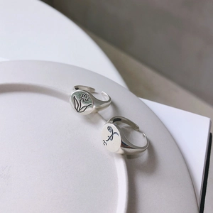 Vintage 925 sterling silver open rings set with engraved floral and abstract face patterns