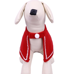 Festive red pet Christmas cloak with white wavy trim and button closure for cats and dogs